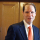 Sen. Ron Wyden, D-Ore., walks near the floor of the Senate on Capitol Hill in Washington.